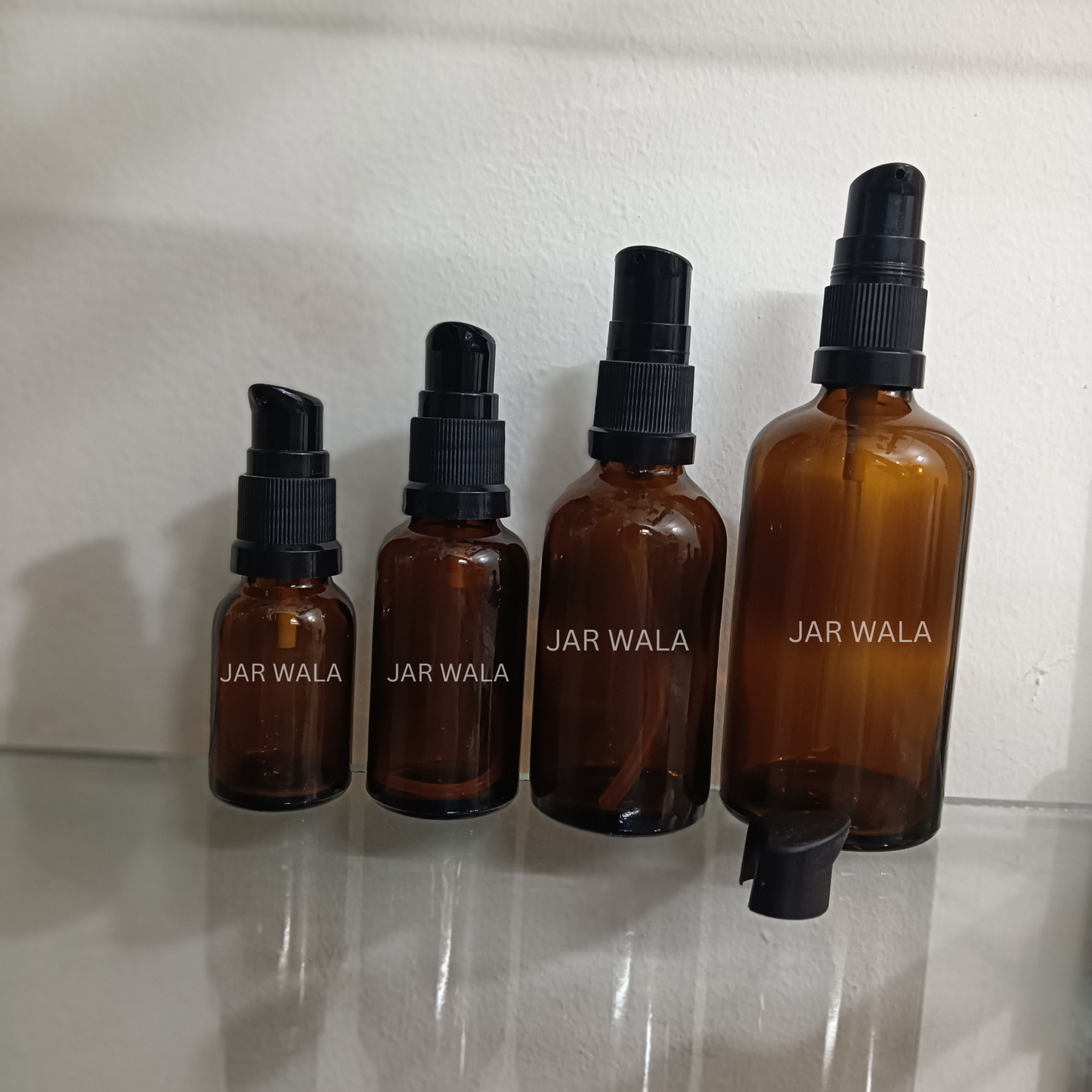 AMBER GLASS BOTTLE WITH BLACK SERUM PUMP